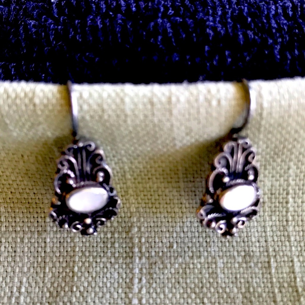 Old fashioned silver earrings